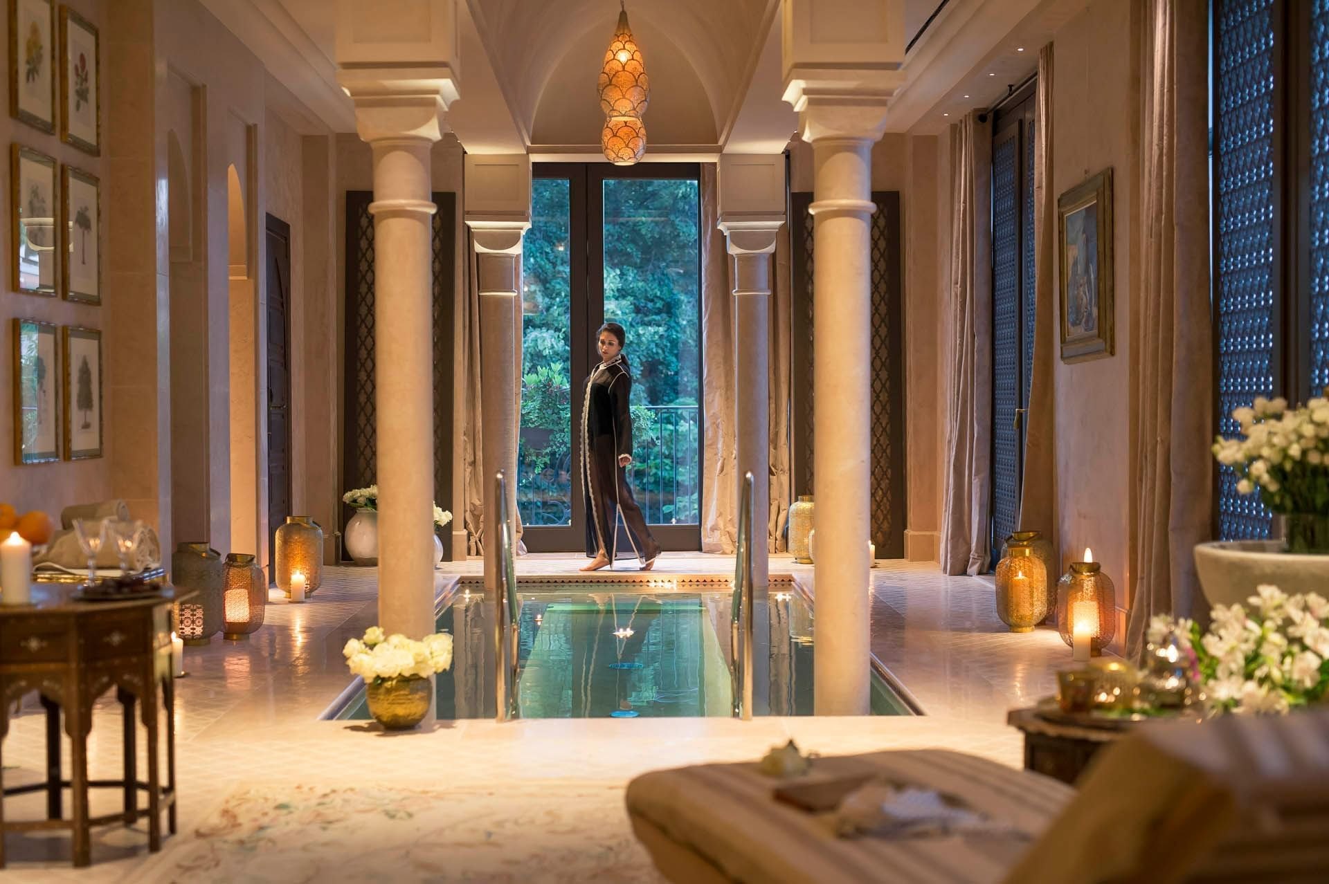 The private Royal Hammam of the Grand Spa at Palazzo Parigi, with columns, lanterns and a plunge pool